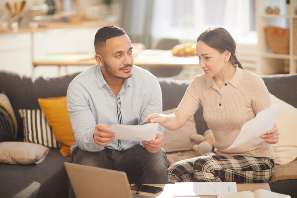 Couple Paying Taxes